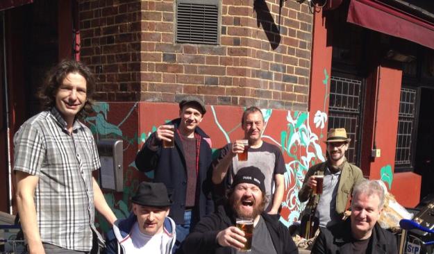 L-R MD Bill Leach, Trumpeteer Ged Fox, Chris 'ukelele' Huff, me, Jonny 'bongo' Hase, John 'no jokes' Lewis and our carer Richard enjoy a pint outside the Bree Louise, Euston Street, afore getting those borrowed trolleys back to Euston, and pouring us all onto the train back home.